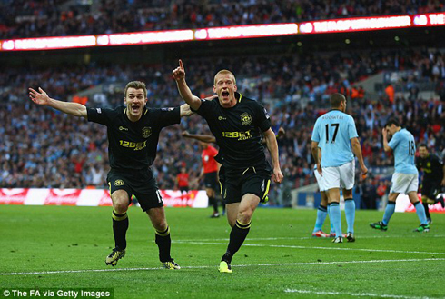 Ben Watson ni we watsinze igitego cyahesheje igikombe Wigan.