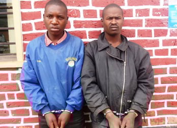 Uwimbabazi Kana (wambaye ikoti ry
